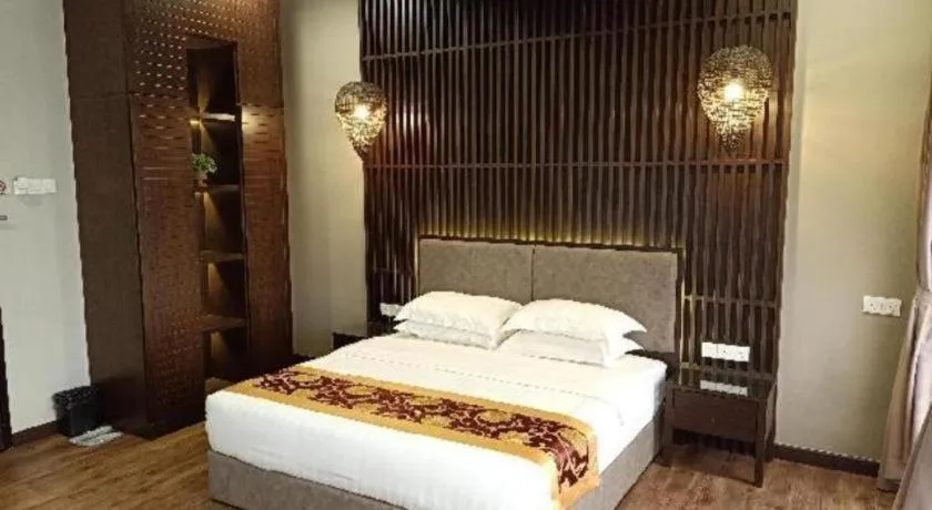 Bed in M GLOBAL HOTEL