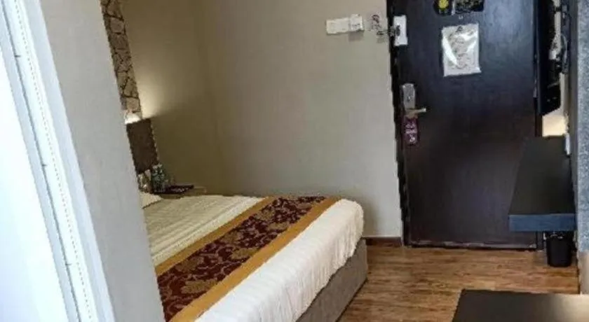 Bed in M GLOBAL HOTEL