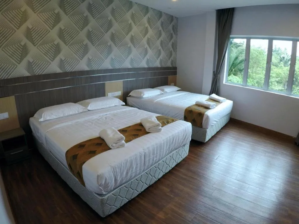 Bed in HOTEL KAWAN BIDOR