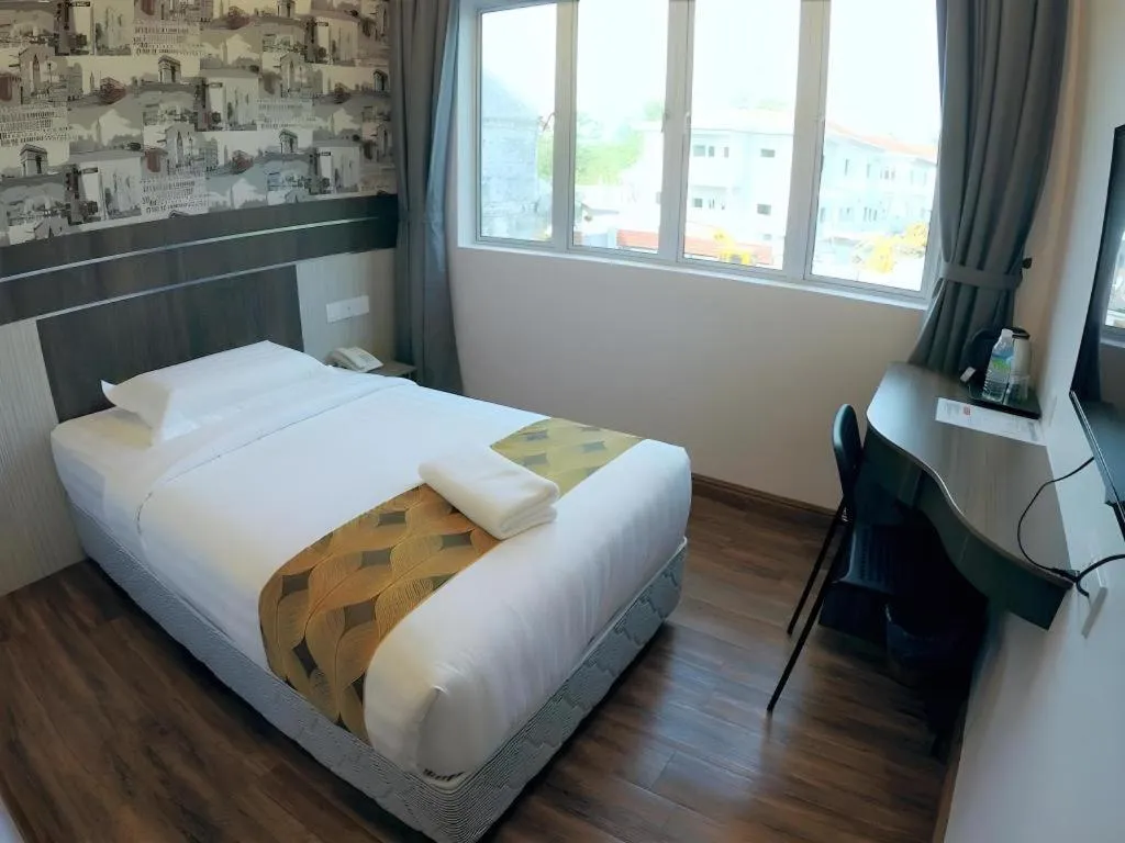 Bed in HOTEL KAWAN BIDOR