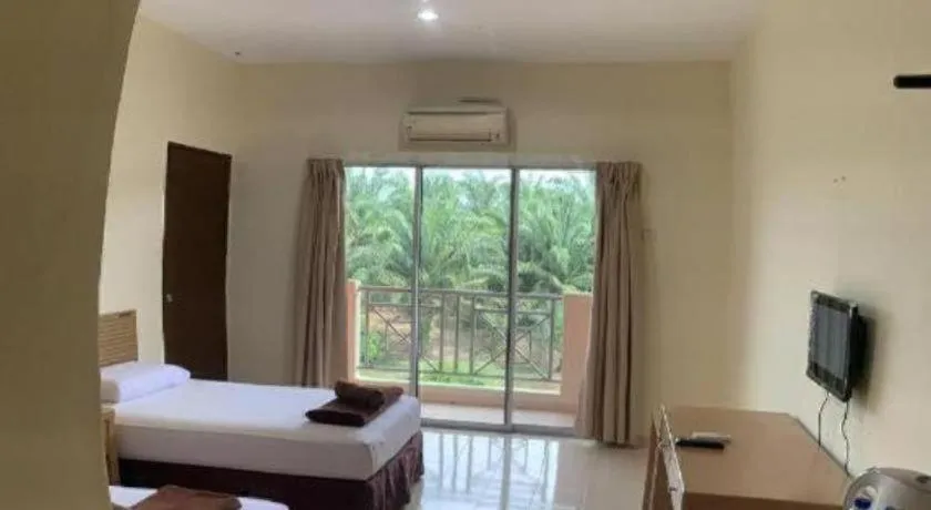 Bed in PAHANG REST HOUSE @ BERA