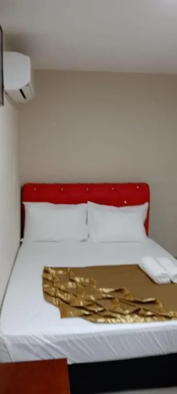 Bed in GEORGETOWN @ NEW WAVE HOTEL