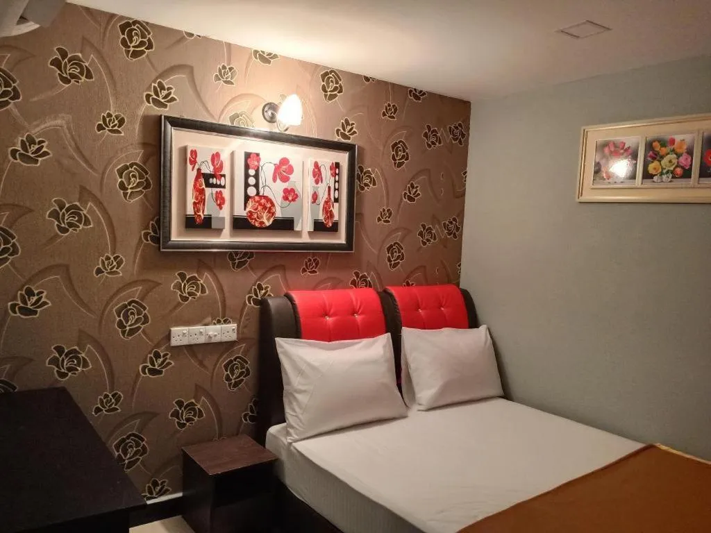 Bed in GEORGETOWN @ NEW WAVE HOTEL