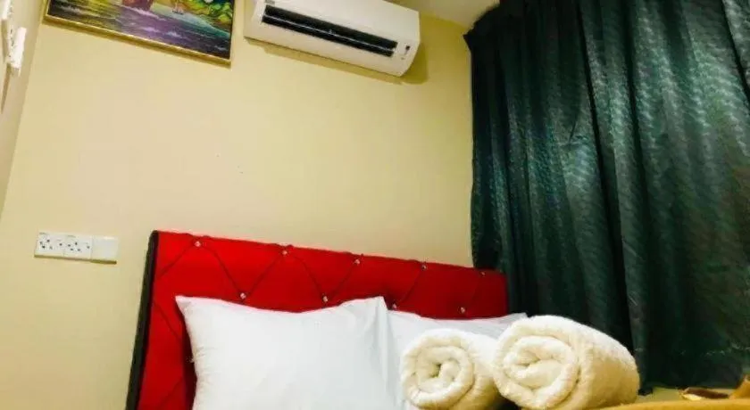 Bed in GEORGETOWN @ NEW WAVE HOTEL