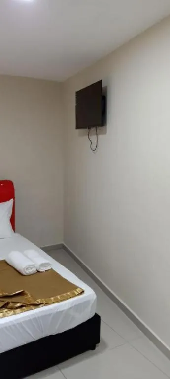 Bed in GEORGETOWN @ NEW WAVE HOTEL