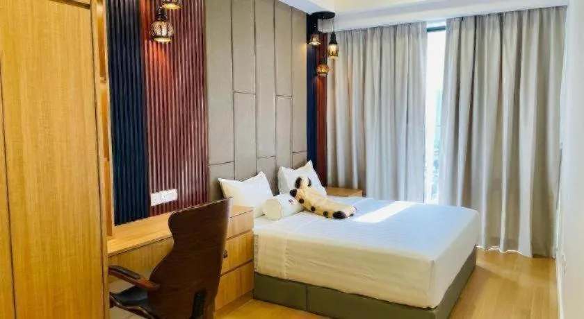 Bed in Sentral Suites By Eassy Hotel