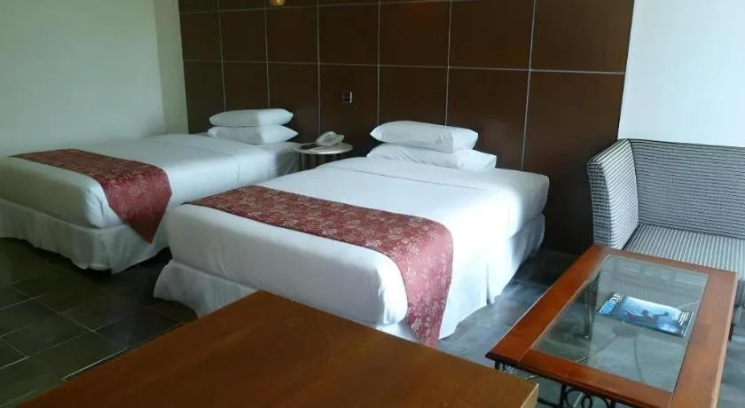 Bed in Century Helang Hotel
