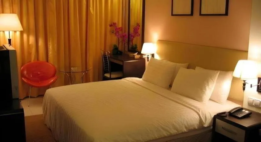 Bed in Ritz Garden Hotel