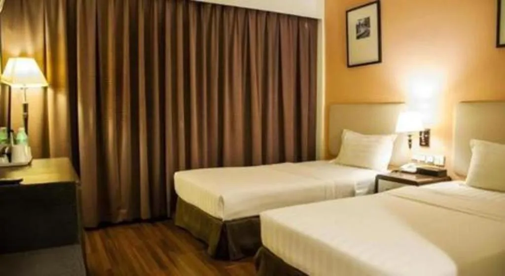 Bed in Ritz Garden Hotel