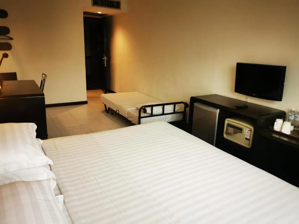 Bed in Ritz Garden Hotel