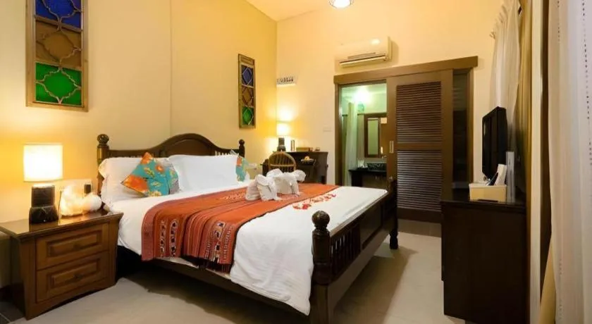 Bed in Anggun Boutique Hotel