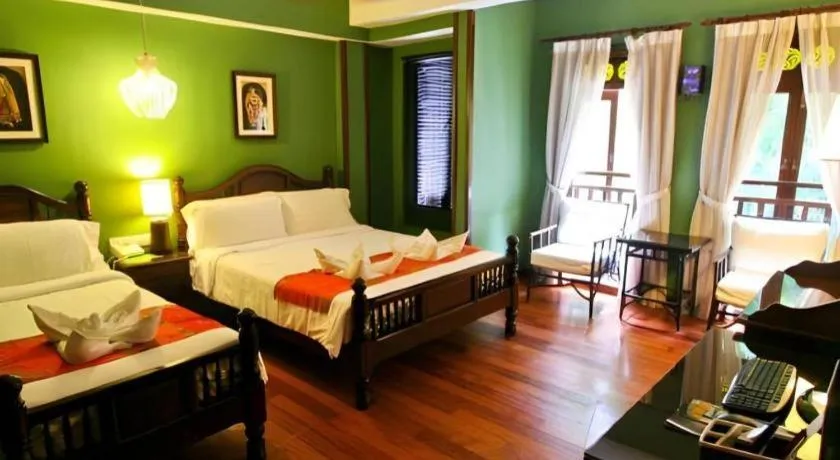 Bed in Anggun Boutique Hotel