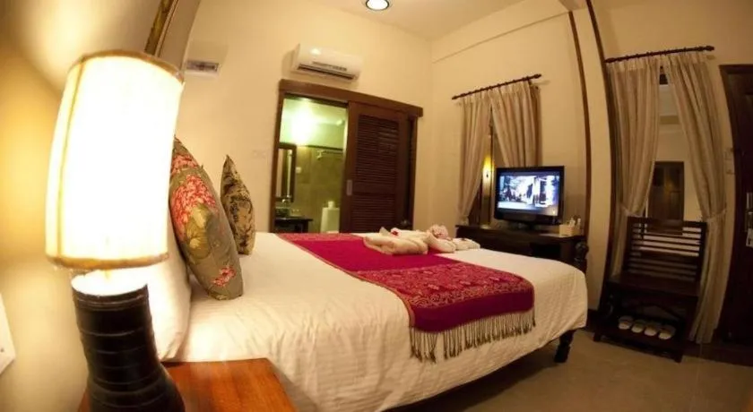Bed in Anggun Boutique Hotel