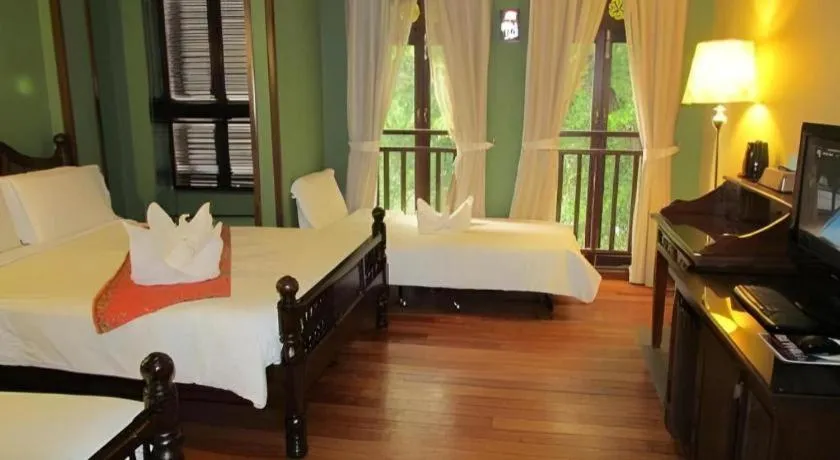 Bed in Anggun Boutique Hotel