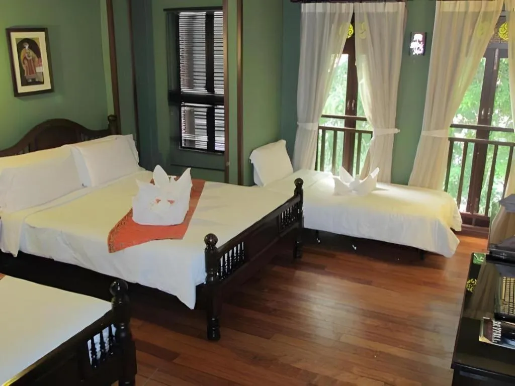 Bed in Anggun Boutique Hotel