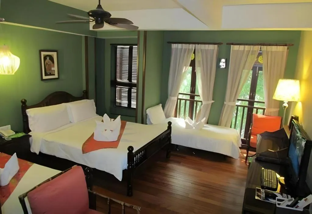Bed in Anggun Boutique Hotel