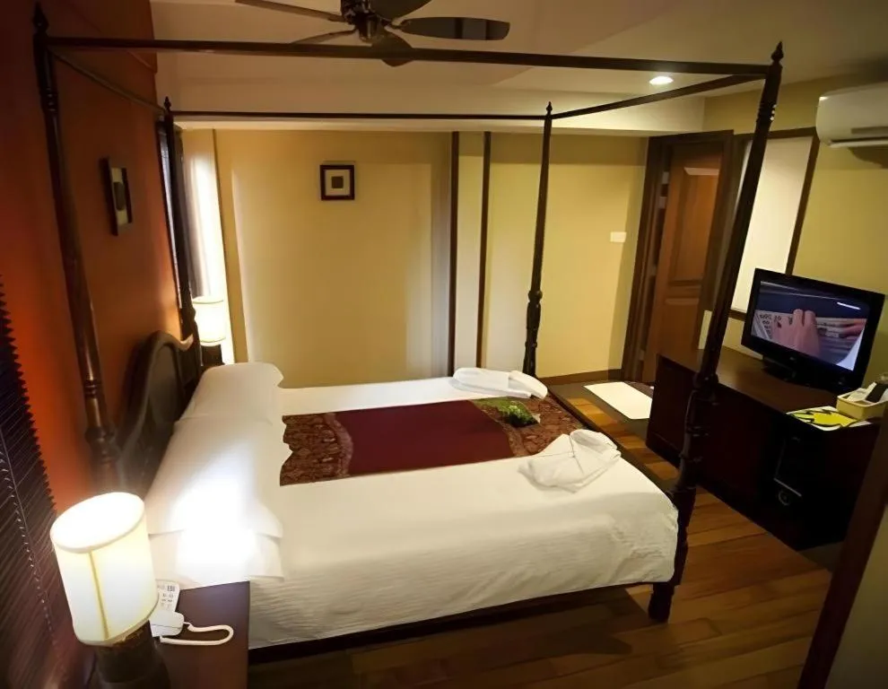 Bed in Anggun Boutique Hotel
