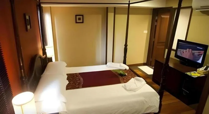 Bed in Anggun Boutique Hotel
