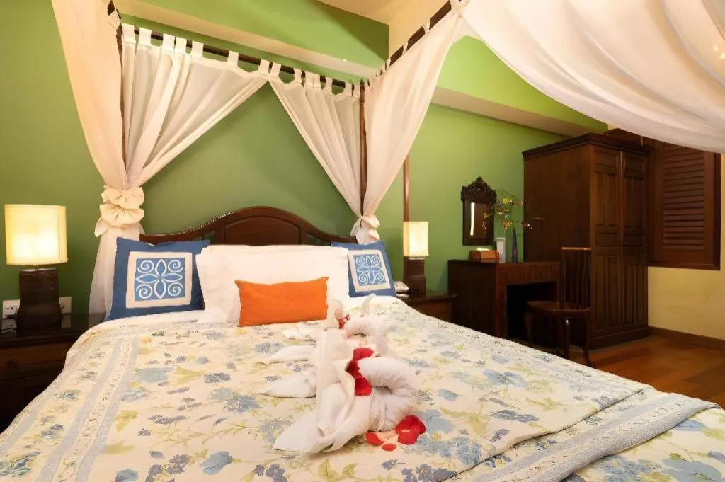 Bed in Anggun Boutique Hotel