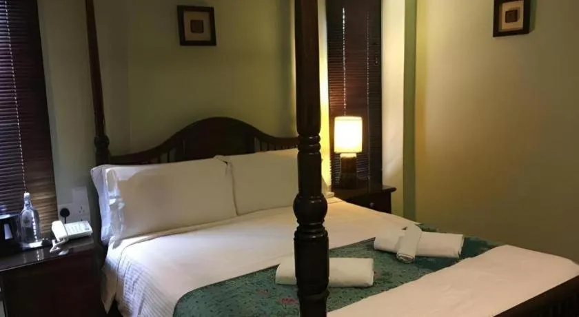 Bed in Anggun Boutique Hotel