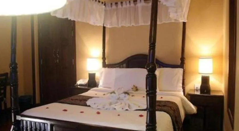 Bed in Anggun Boutique Hotel