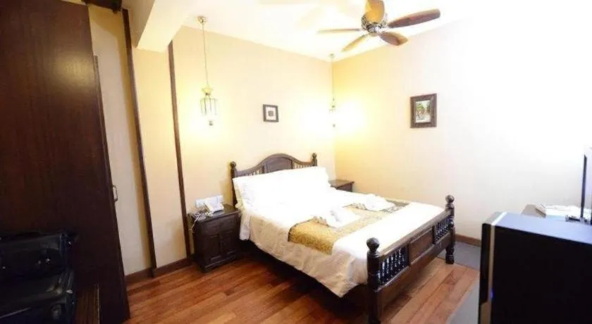 Bed in Anggun Boutique Hotel