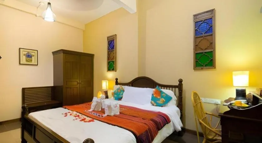 Bed in Anggun Boutique Hotel