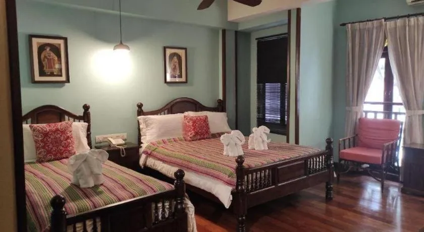 Bed in Anggun Boutique Hotel