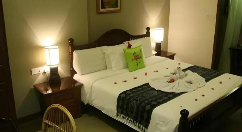 Bed in Anggun Boutique Hotel