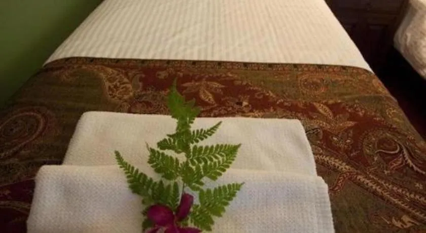 Bed in Anggun Boutique Hotel