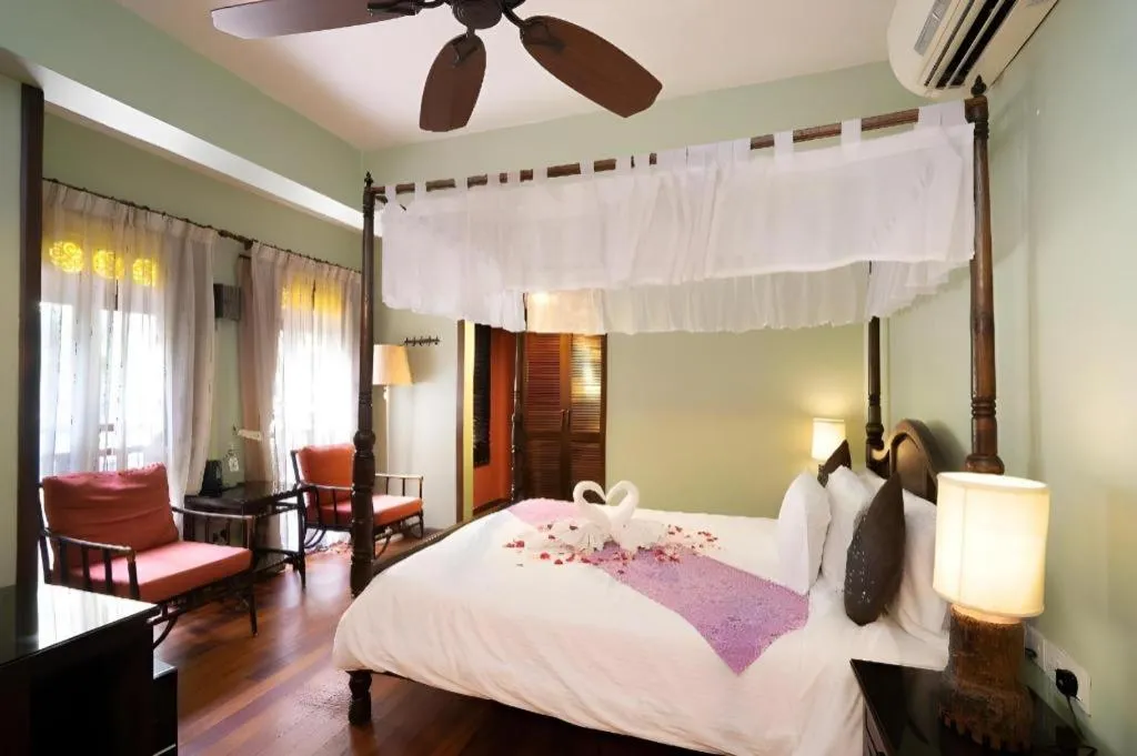 Bed in Anggun Boutique Hotel