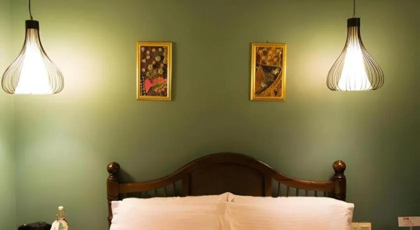 Bed in Anggun Boutique Hotel