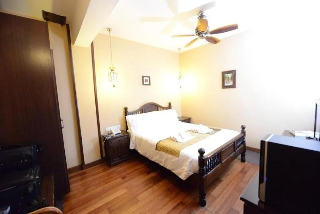 Bed in Anggun Boutique Hotel