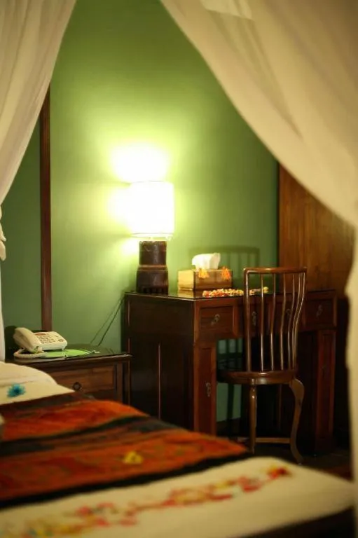 Bed in Anggun Boutique Hotel