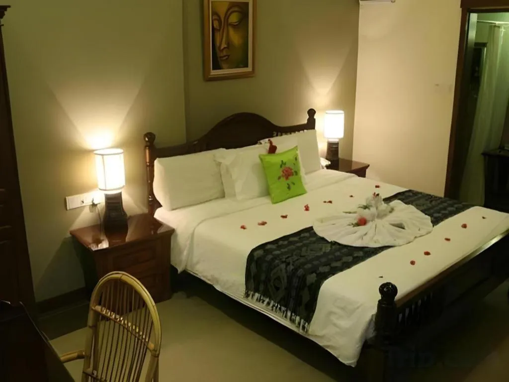 Bed in Anggun Boutique Hotel