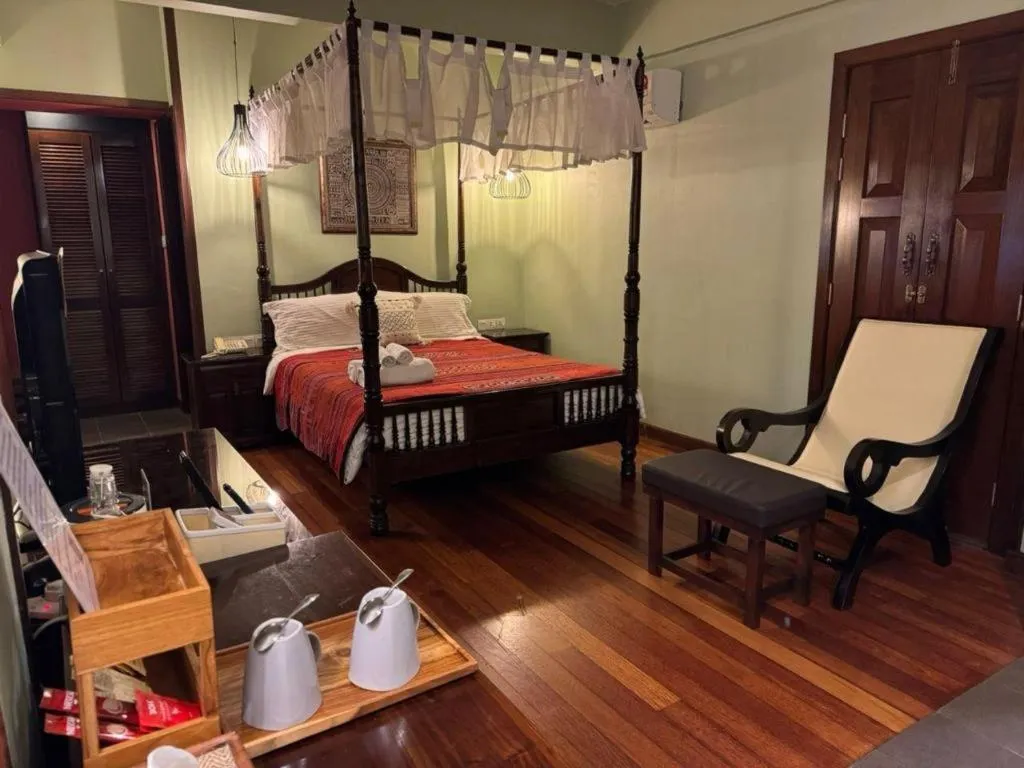 Bed in Anggun Boutique Hotel