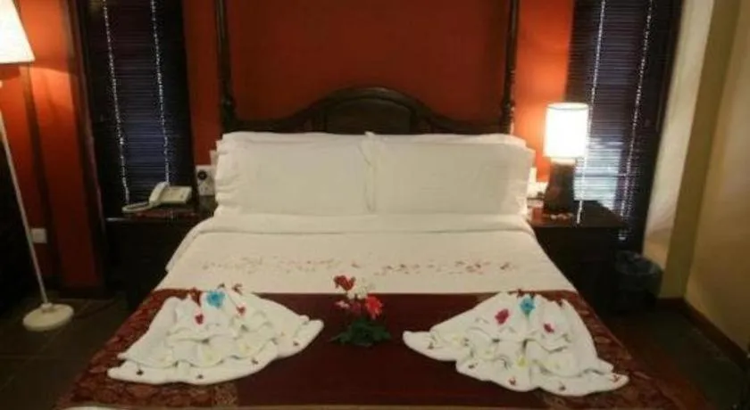 Bed in Anggun Boutique Hotel