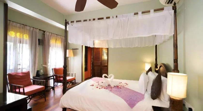 Bed in Anggun Boutique Hotel