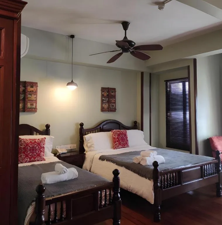 Bed in Anggun Boutique Hotel