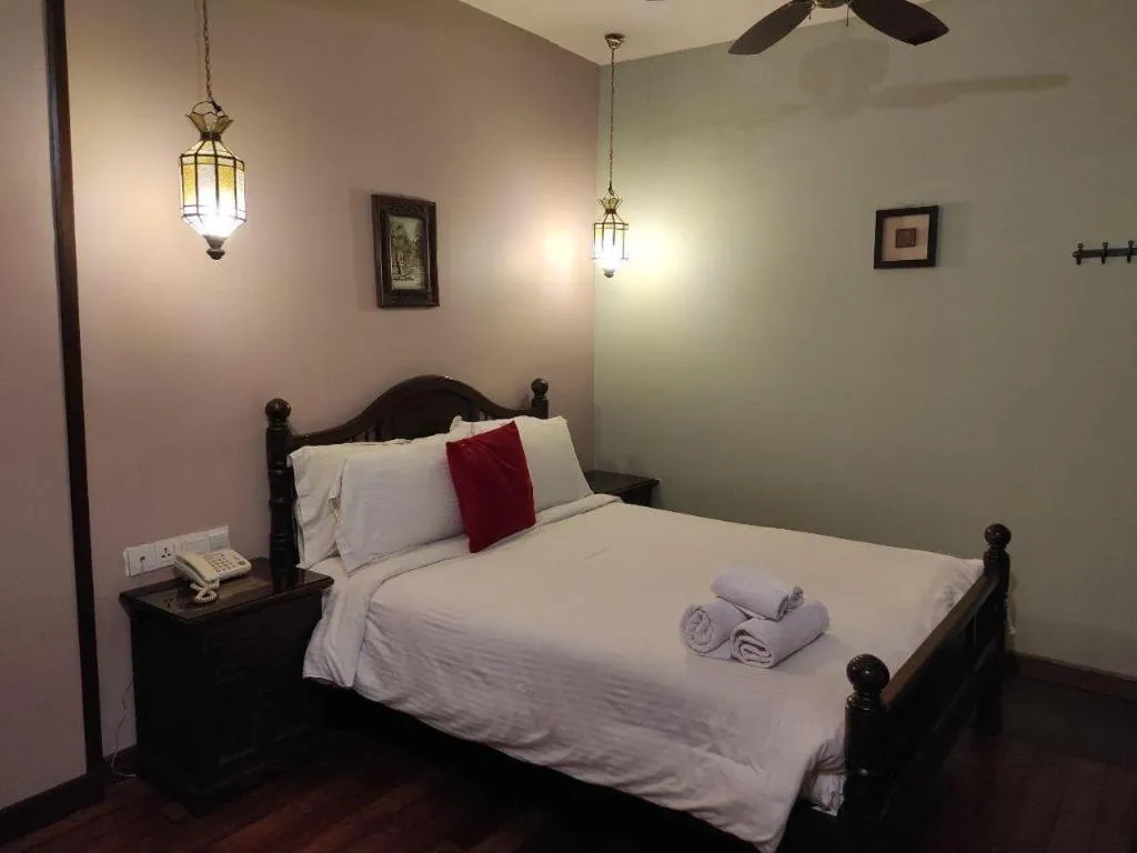 Bed in Anggun Boutique Hotel