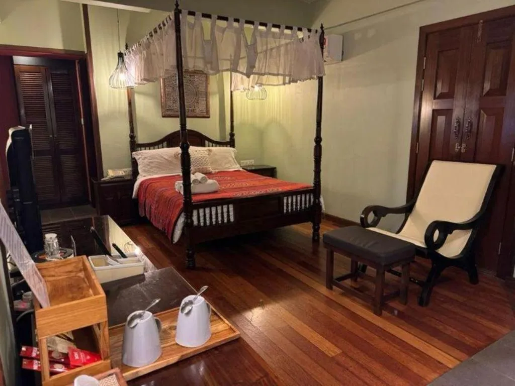 Bed in Anggun Boutique Hotel