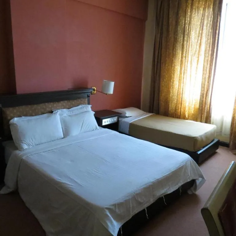 Bed in Kuala Lumpur International Hotel