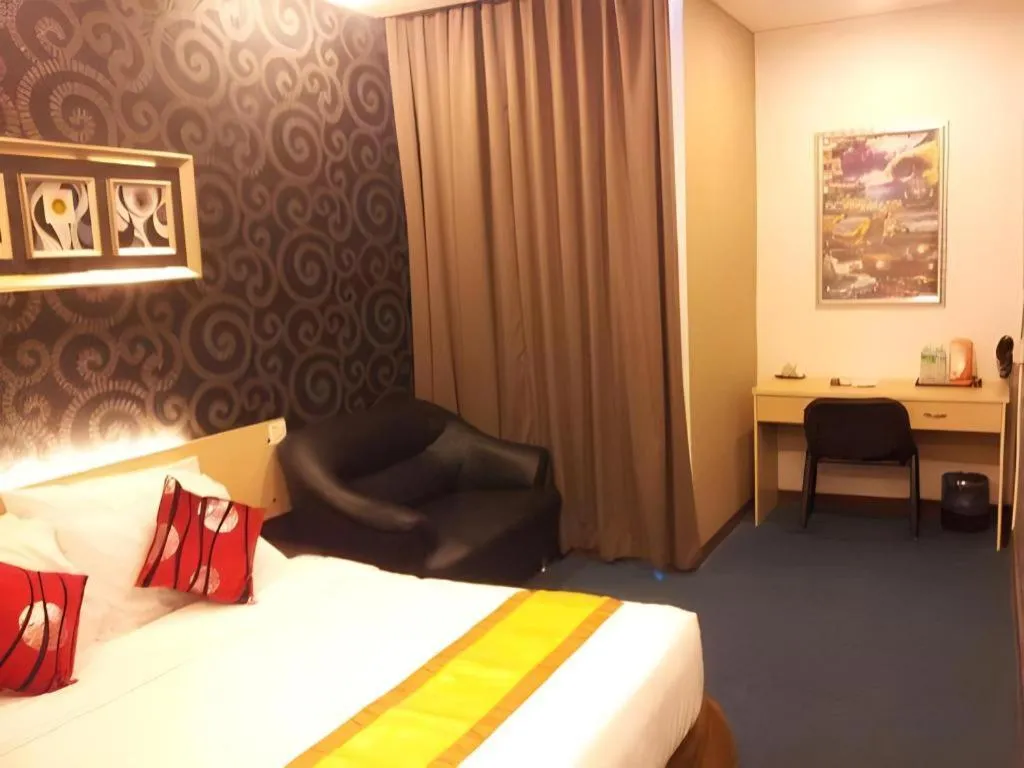 Bed in Paragon City Hotel