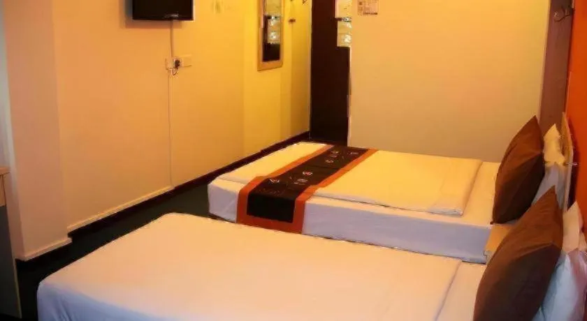 Bed in Paragon City Hotel