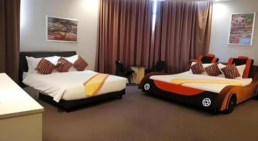 Bed in Paragon City Hotel