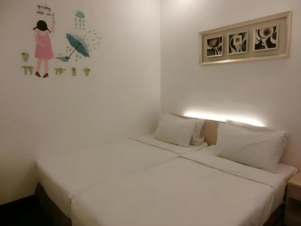 Bed in Paragon City Hotel