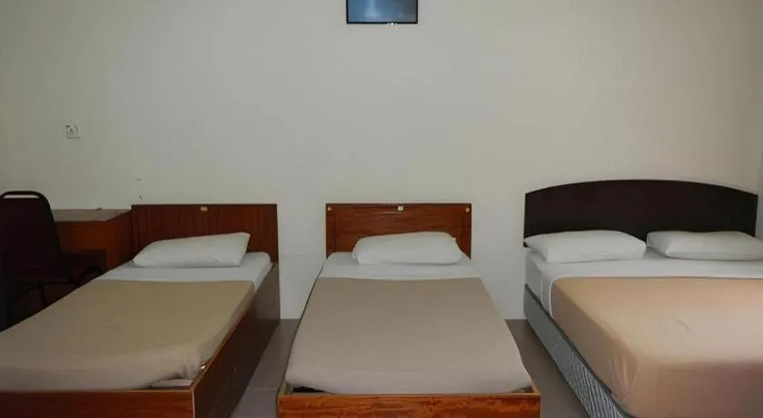 Bed in KRS Pines Hotel
