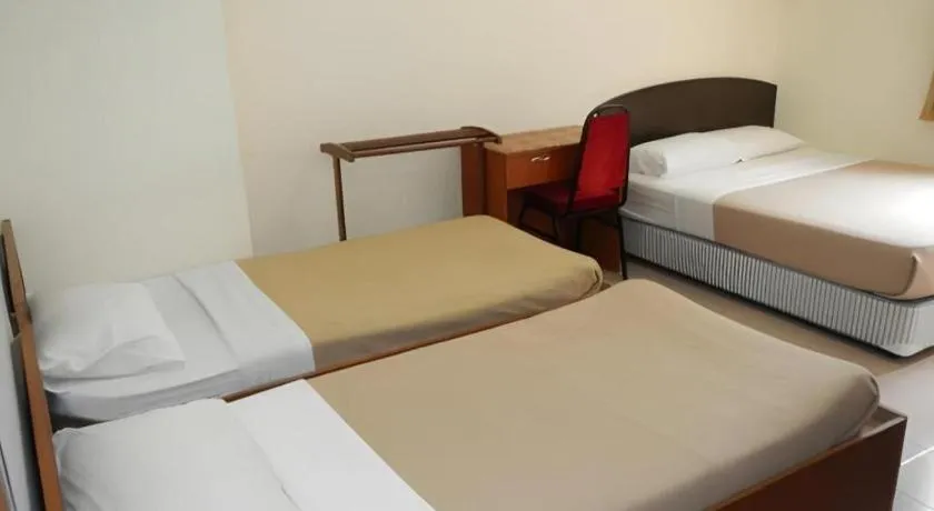 Bed in KRS Pines Hotel