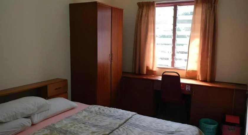 Bed in KRS Pines Hotel