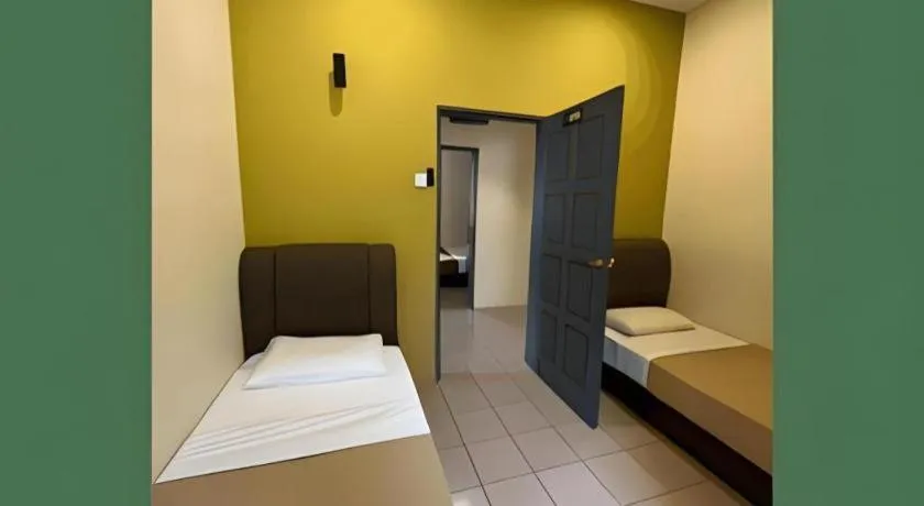 Bed in KRS Pines Hotel